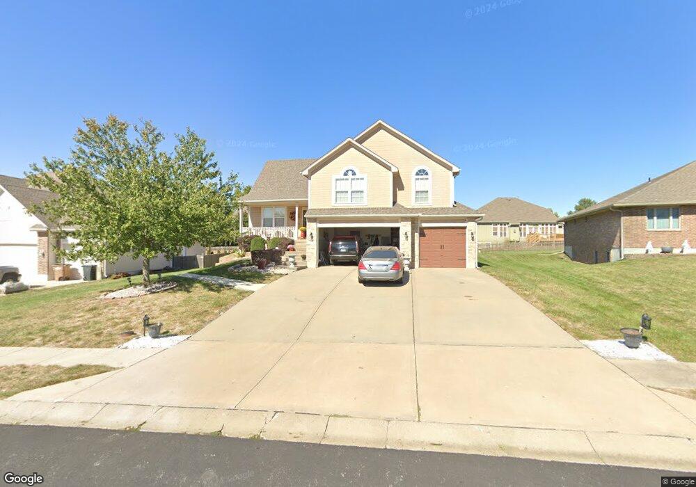 1512 Saddlebrook Rd, Raymore, MO 64083 - photo 1