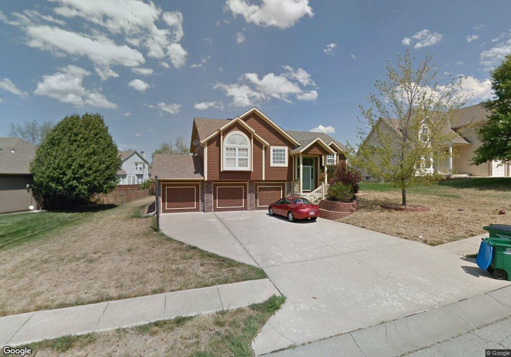 1516 Colt Cir, Raymore, MO 64083 - photo 1