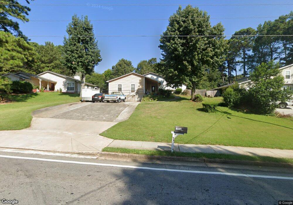 1098 Dickens Rd NW, Lilburn, GA 30047 - photo 1