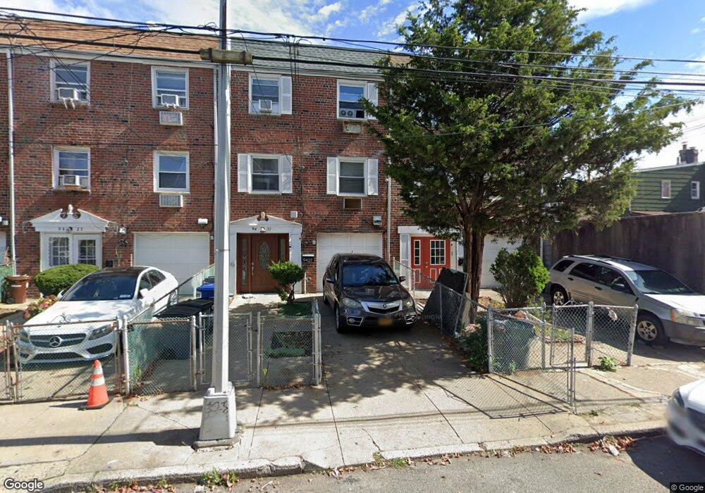 9427 83rd St, Ozone Park, NY 11416 - photo 1