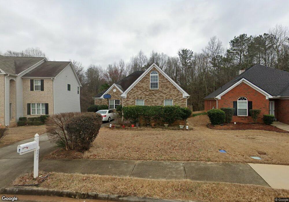 4042 Village Crossing Cir, Ellenwood, GA 30294 - photo 1
