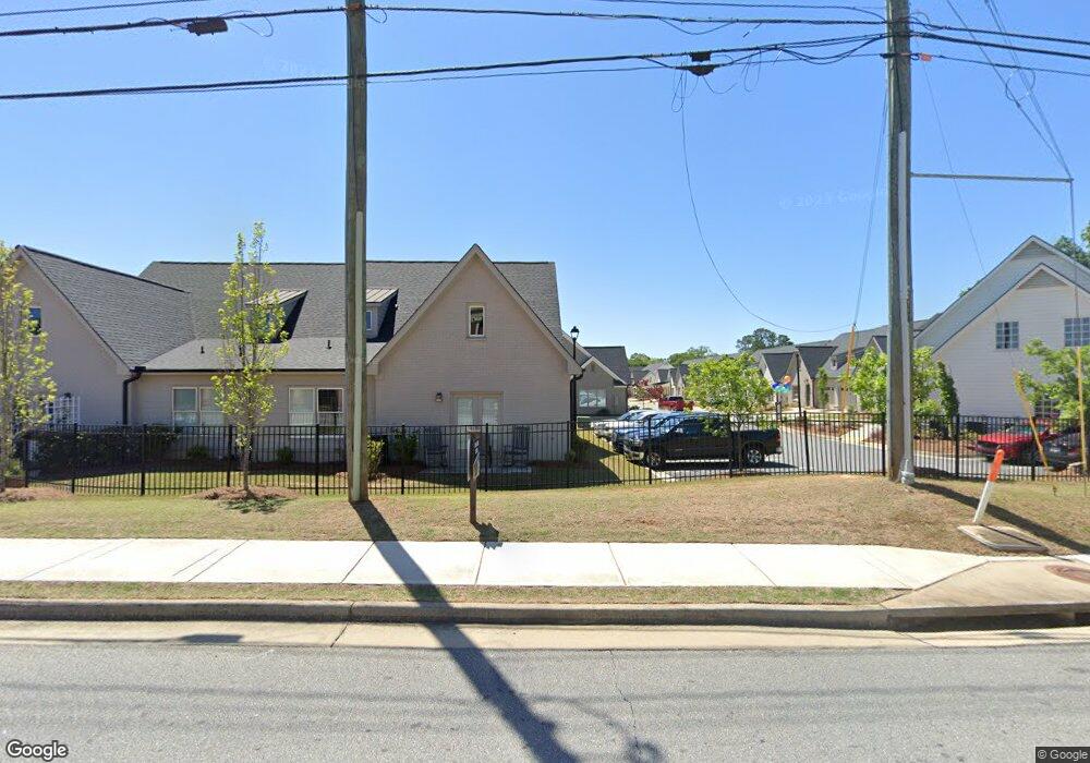 5038 Noble Village Way unit 23, Lilburn, GA 30047 - photo 1