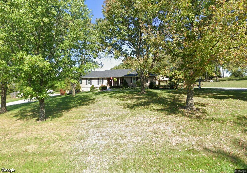 1102 N Jackson St, Raymore, MO 64083 - photo 1
