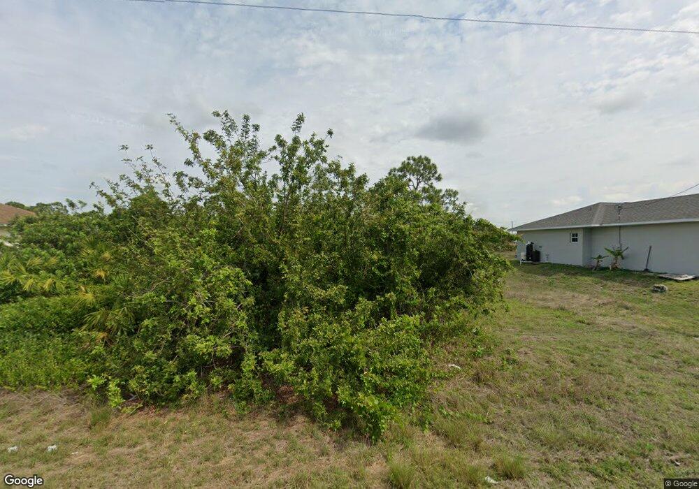 1129 Ermine St E, Lehigh Acres, FL 33974 - photo 1
