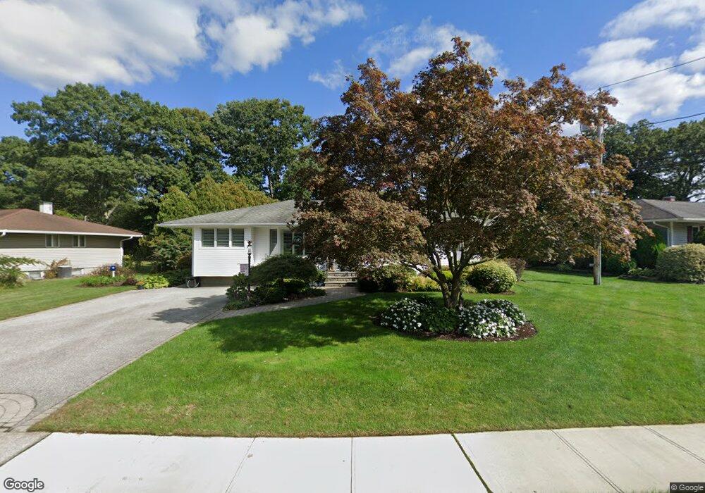 57 Fisher Rd, ComMacK, NY 11725 - photo 1