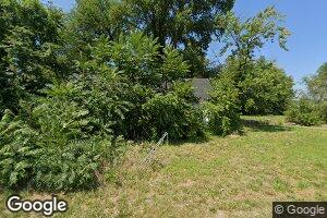 104 E 4th St, Henrietta, MO 64036