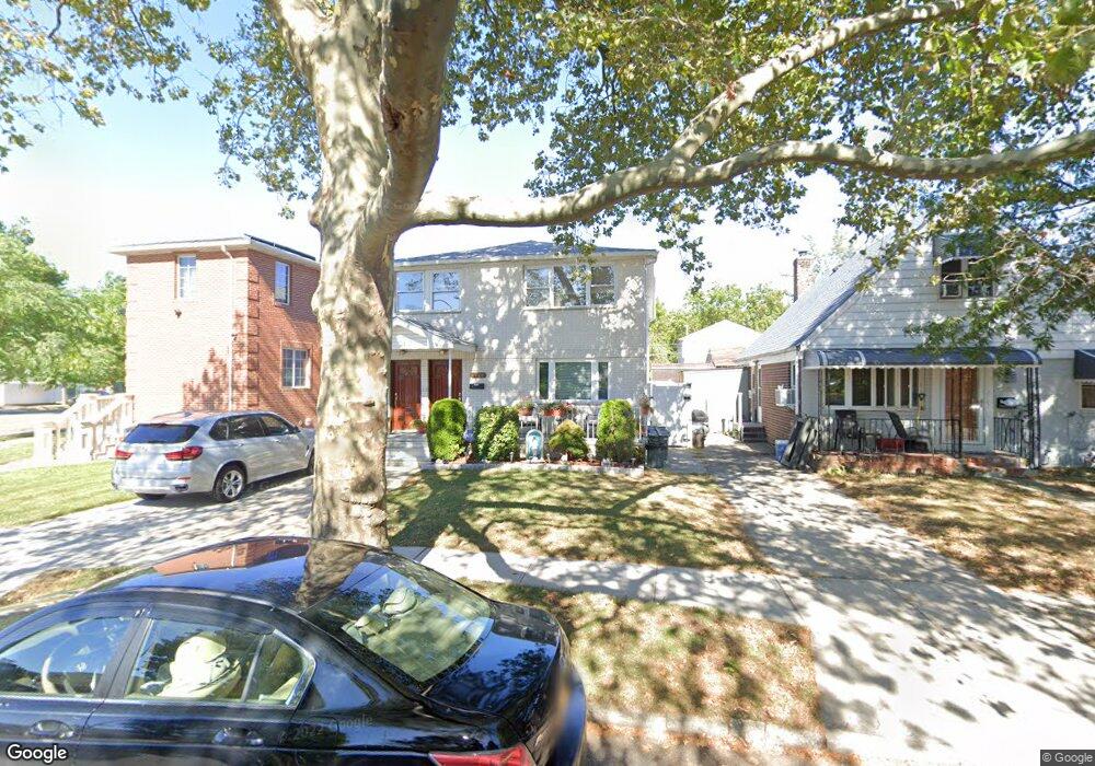 7703 252nd St, Bellerose, NY 11426 - photo 1