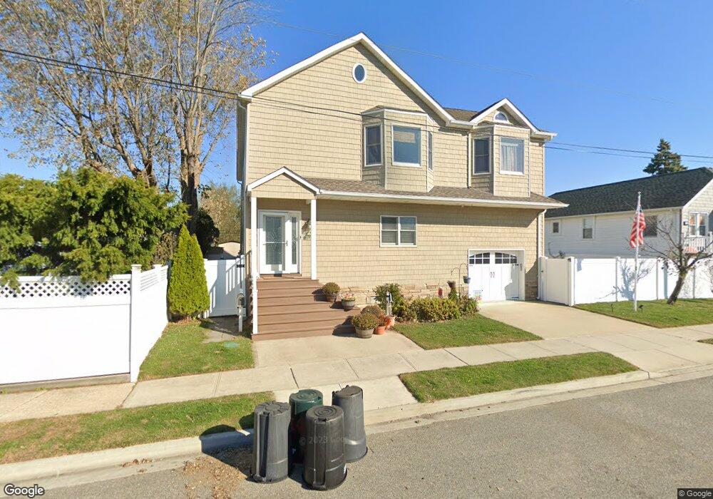 1033 Knickerbocker Rd, Island Park, NY 11558 - photo 1