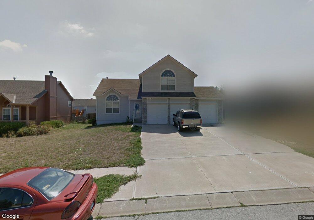 1101 Camelot Dr, Raymore, MO 64083 - photo 1