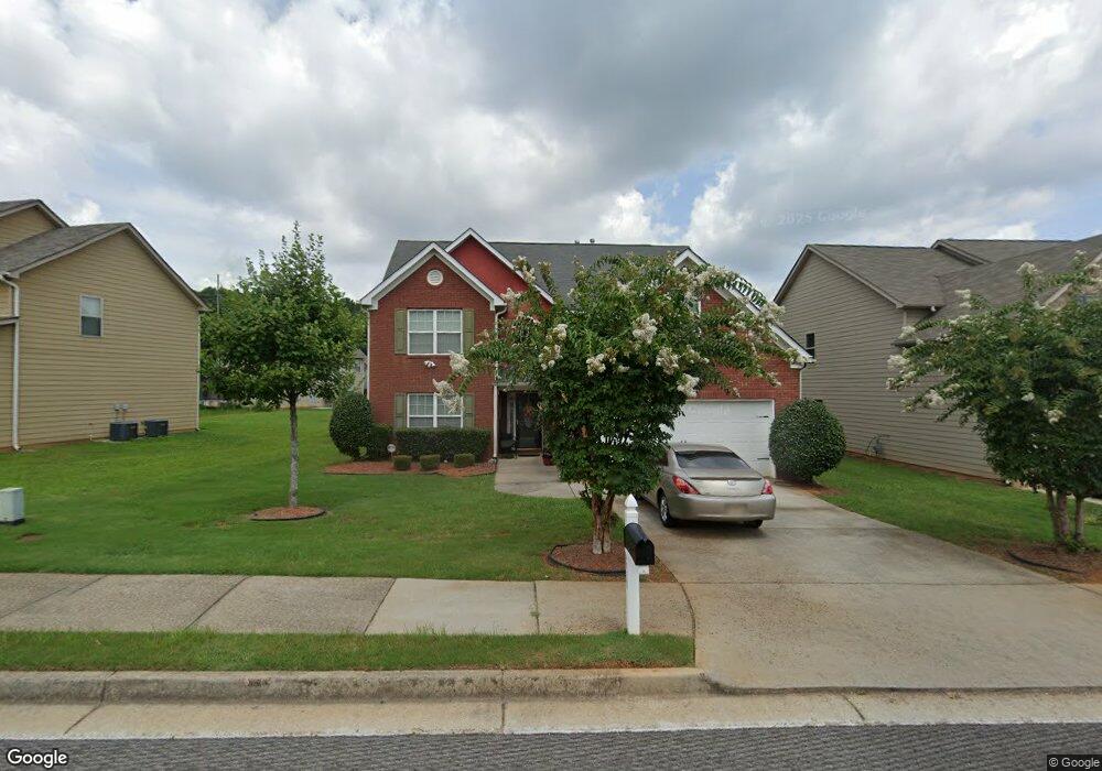 4029 Village Crossing Cir, Ellenwood, GA 30294 - photo 1