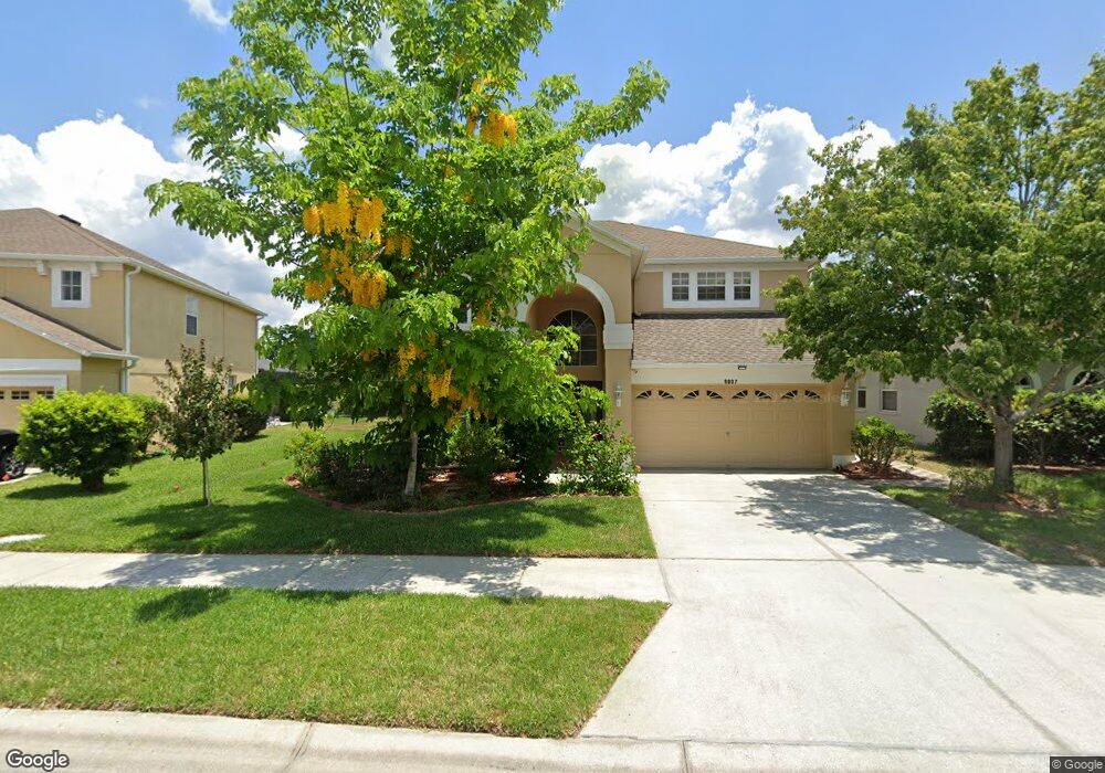 9807 Simeon Dr, Land O Lakes, FL 34638 - photo 1