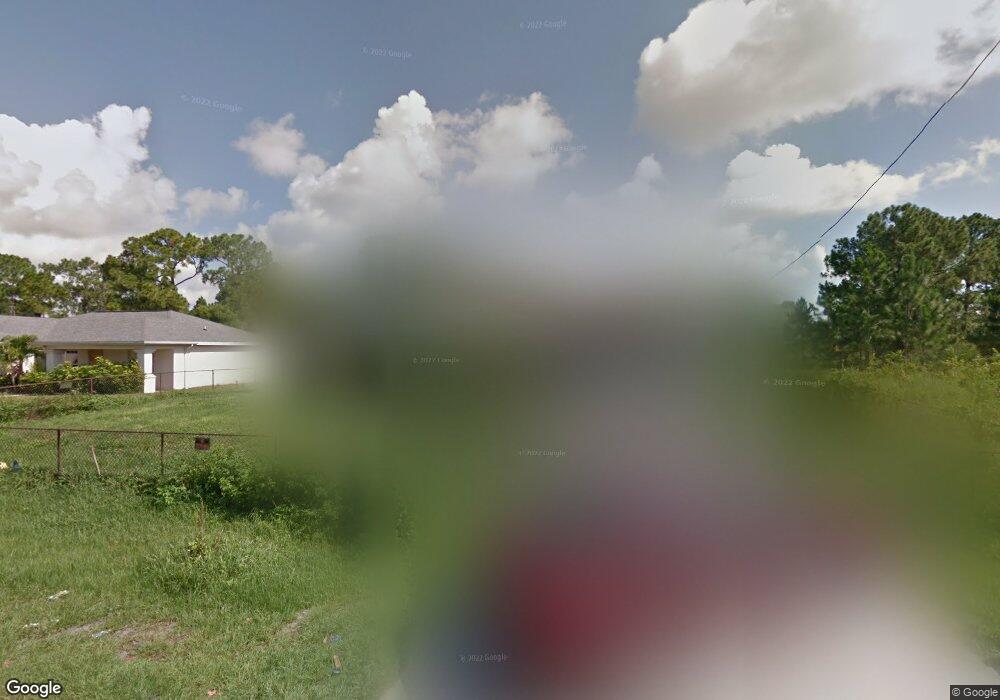 1111 Enrique St E, Lehigh Acres, FL 33974 - photo 1