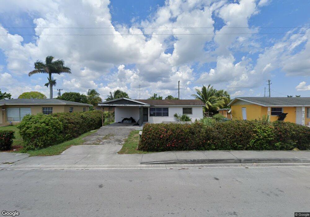 548 SW 10th St, Belle Glade, FL 33430 - photo 1