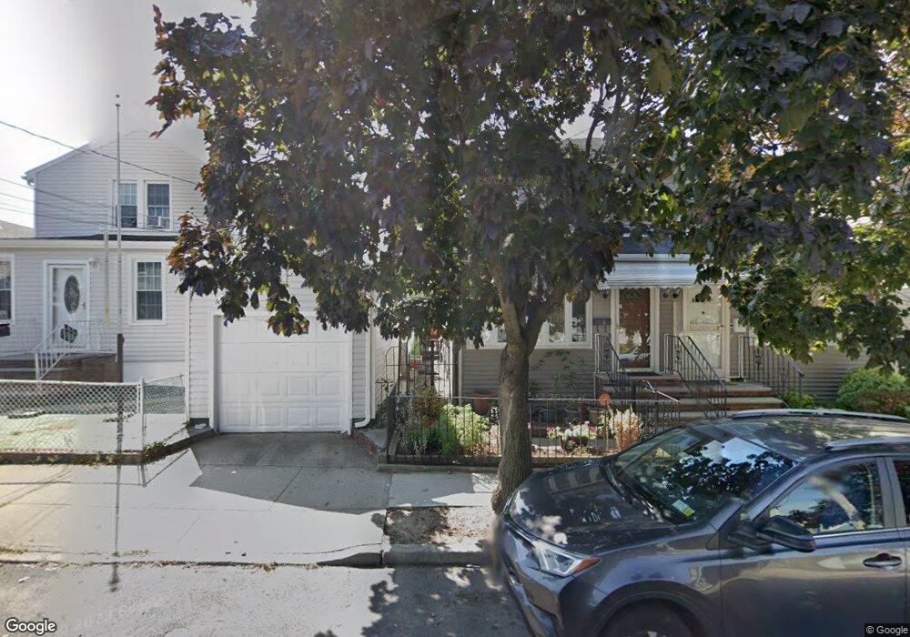 9036 Silver Rd, Ozone Park, NY 11417 - photo 1