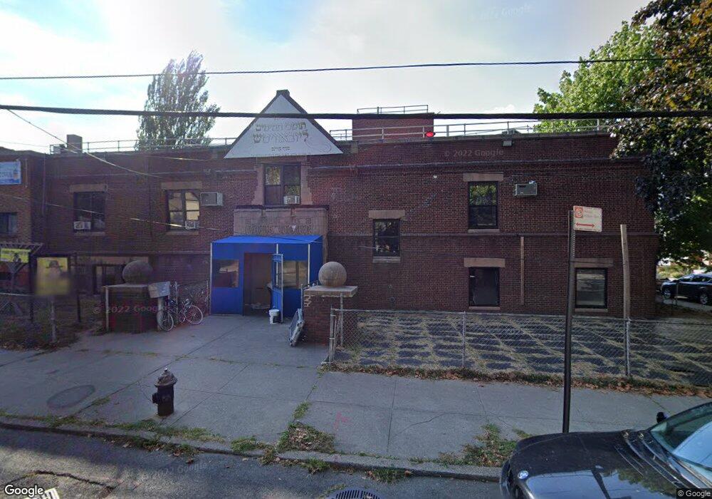 9215 69th Ave, Flushing, NY 11375 - photo 1