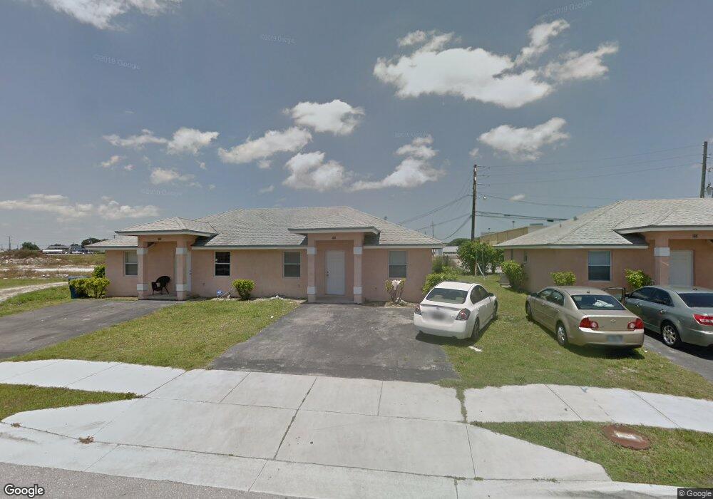 596 SW 14th St, Belle Glade, FL 33430 - photo 1