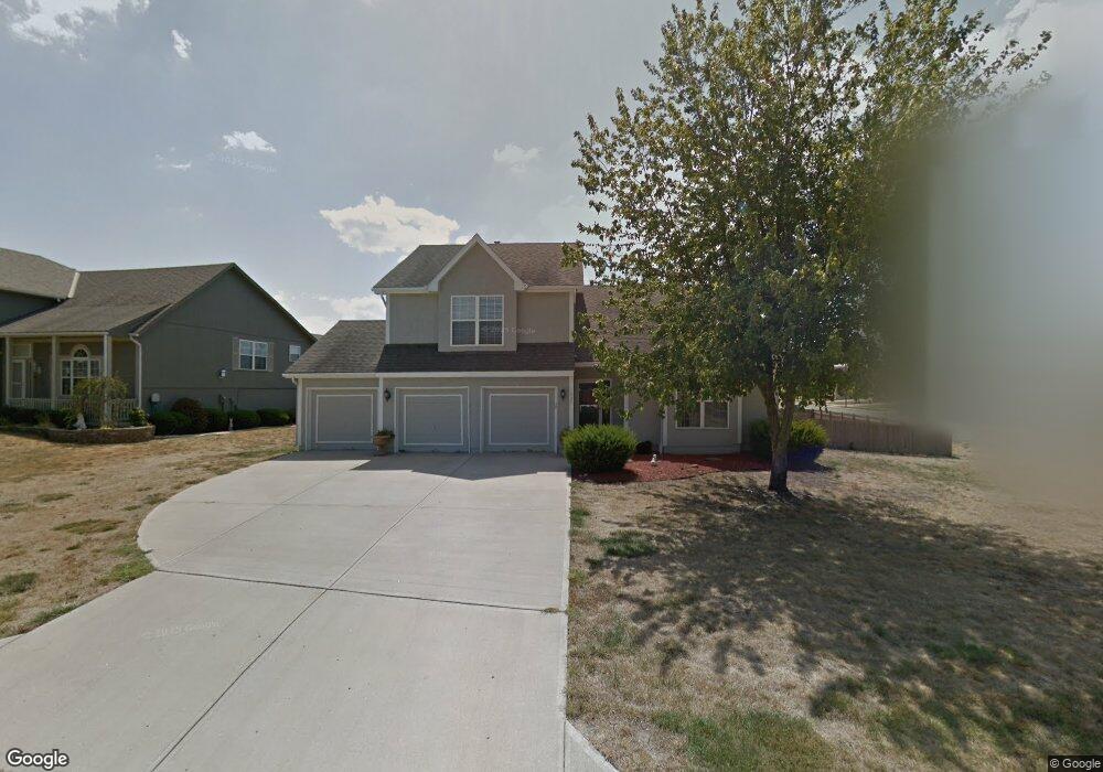 1535 Horseshoe Dr, Raymore, MO 64083 - photo 1