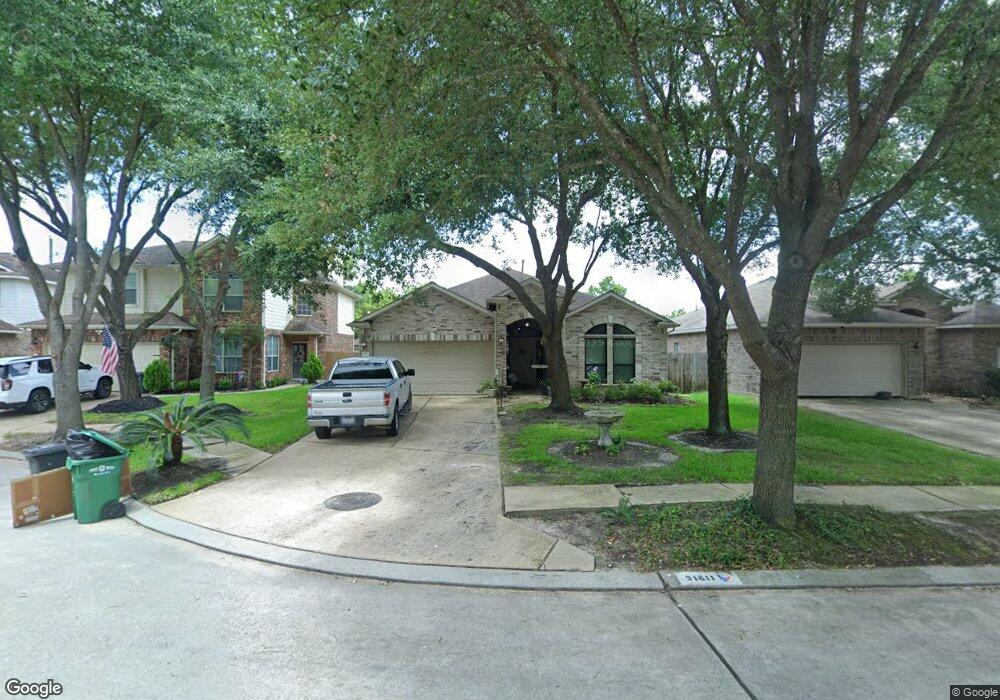 31611 Forest Oak Park Ct, Conroe, TX 77385 - photo 1