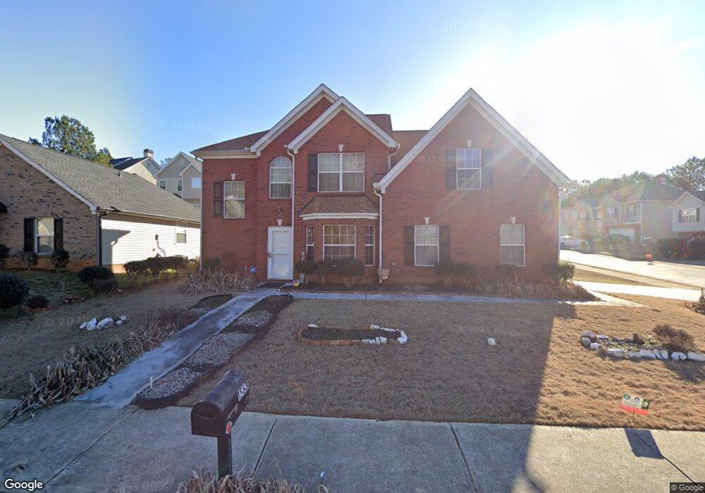 1568 Queen Elizabeth Dr, Locust Grove, GA 30248 - photo 1