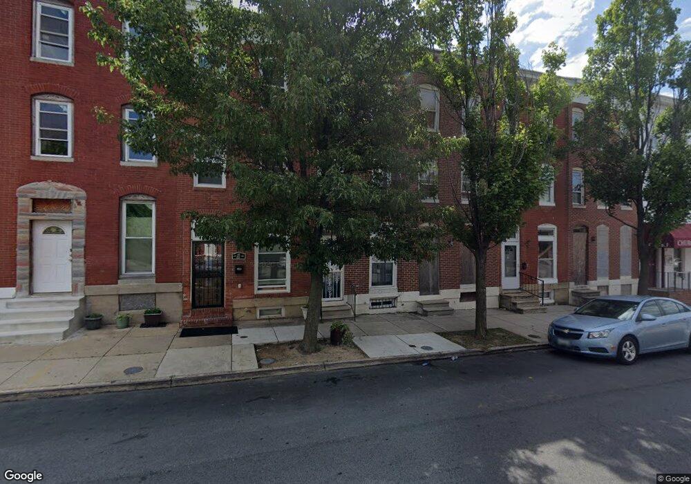 309 N Stricker St, Baltimore, MD 21223 - photo 1