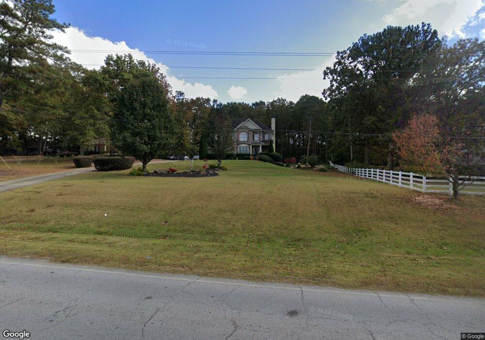 1406 Hewatt Rd SW, Lilburn, GA 30047 - photo 1