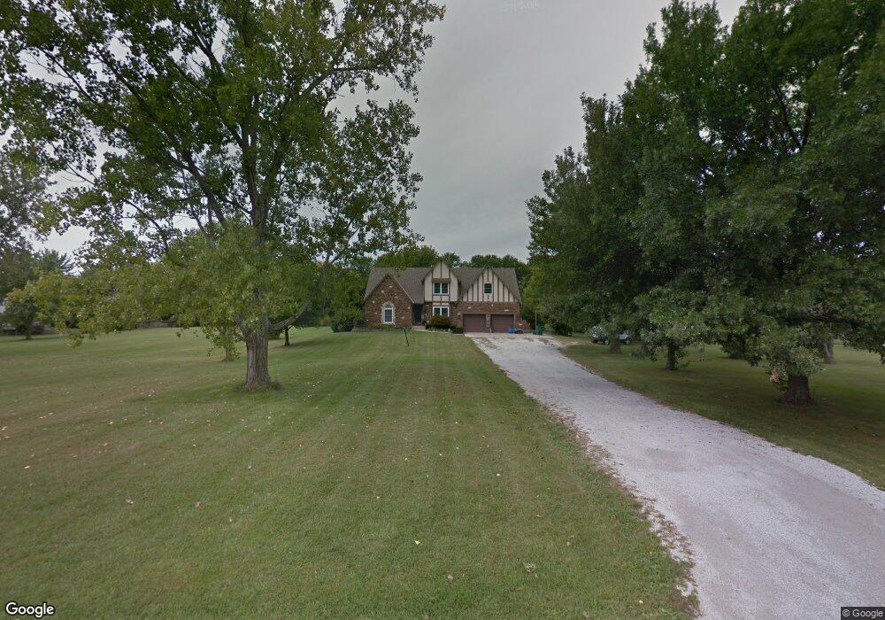 1310 E Meadow Brook Dr, Raymore, MO 64083 - photo 1