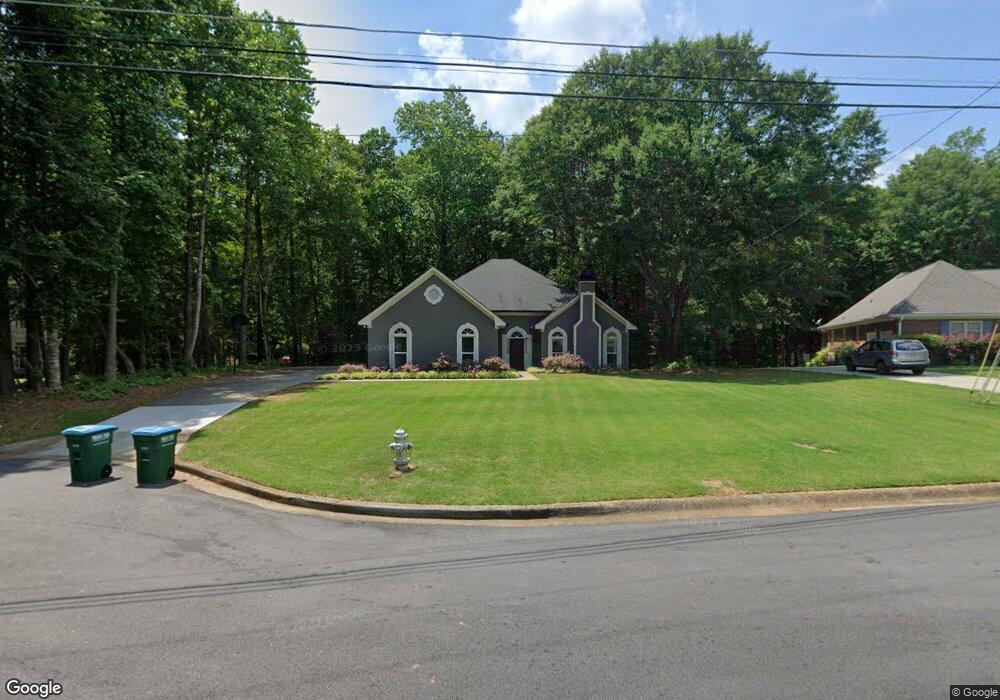 3925 Riverbank Dr SW, Lilburn, GA 30047 - photo 1