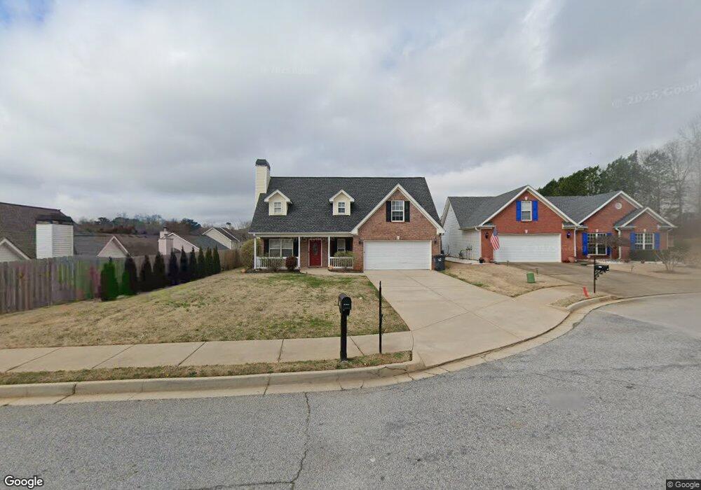 1705 Queen Victoria Ct unit 9, Locust Grove, GA 30248 - photo 1