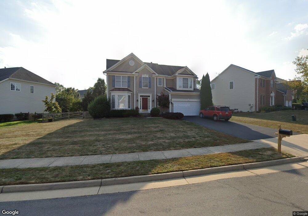 9128 Big Springs Loop, Bristow, VA 20136 - photo 1