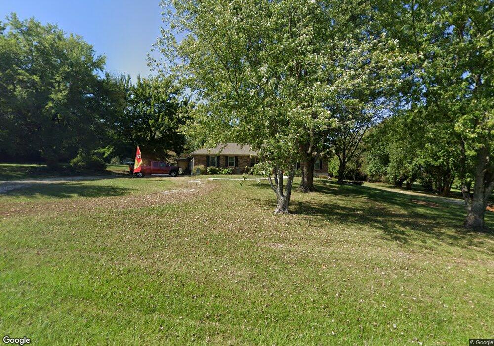 1010 N Jackson St, Raymore, MO 64083 - photo 1