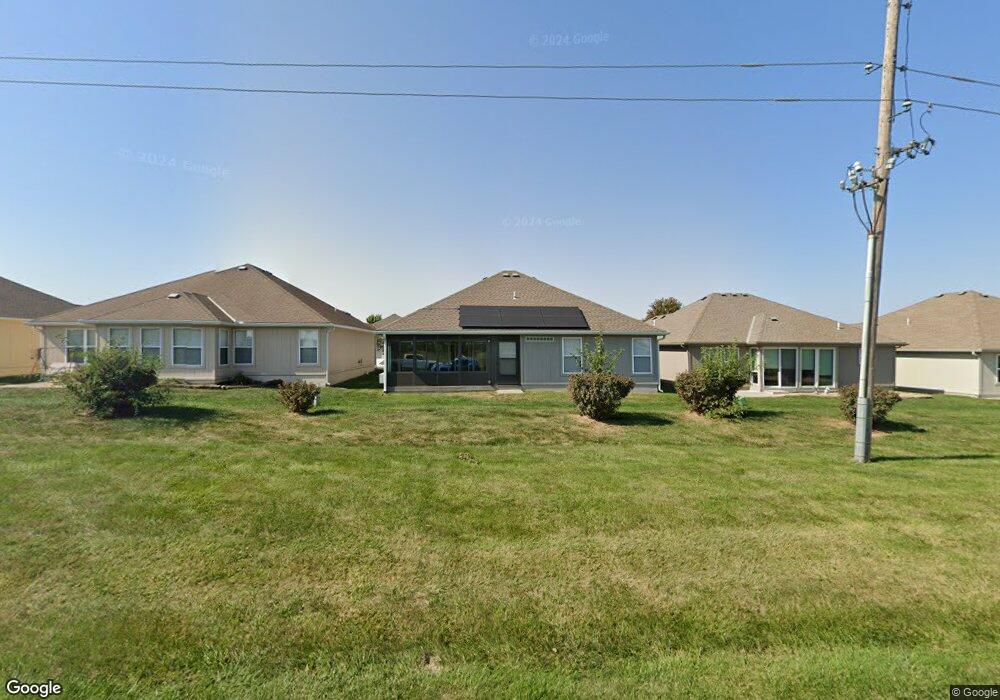 516 Neptune Dr, Raymore, MO 64083 - photo 1
