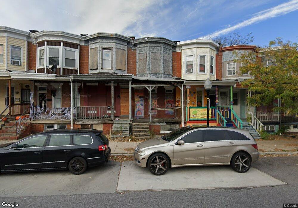 310 N Pulaski St, Baltimore, MD 21223 - photo 1