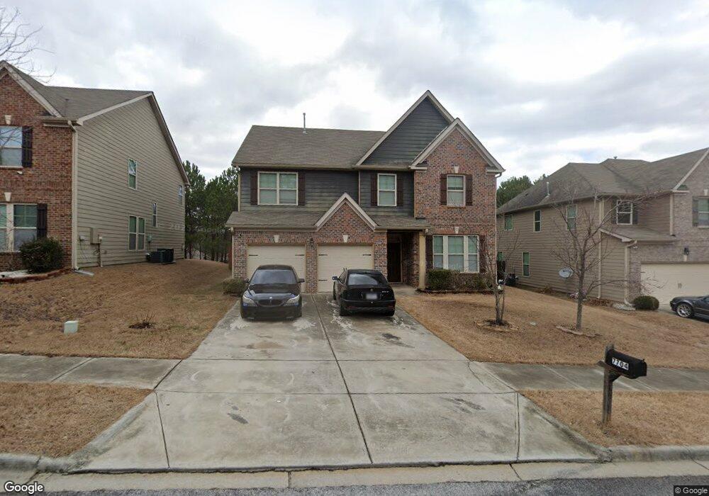 7704 Outcrop Pass unit 62, Lithonia, GA 30058 - photo 1