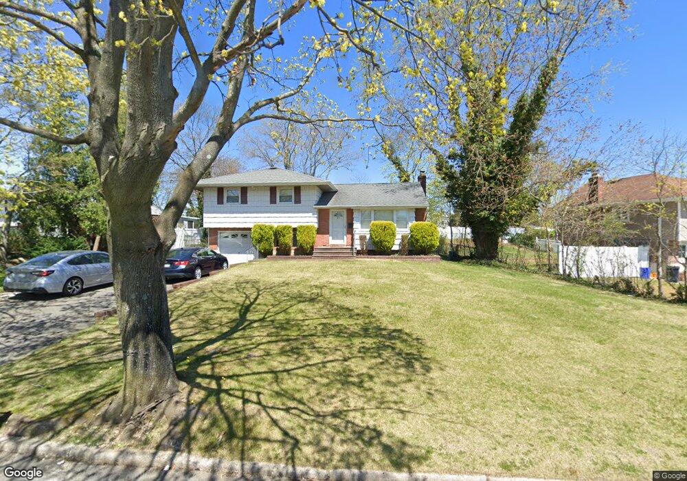 39 Elder Dr, ComMacK, NY 11725 - photo 1