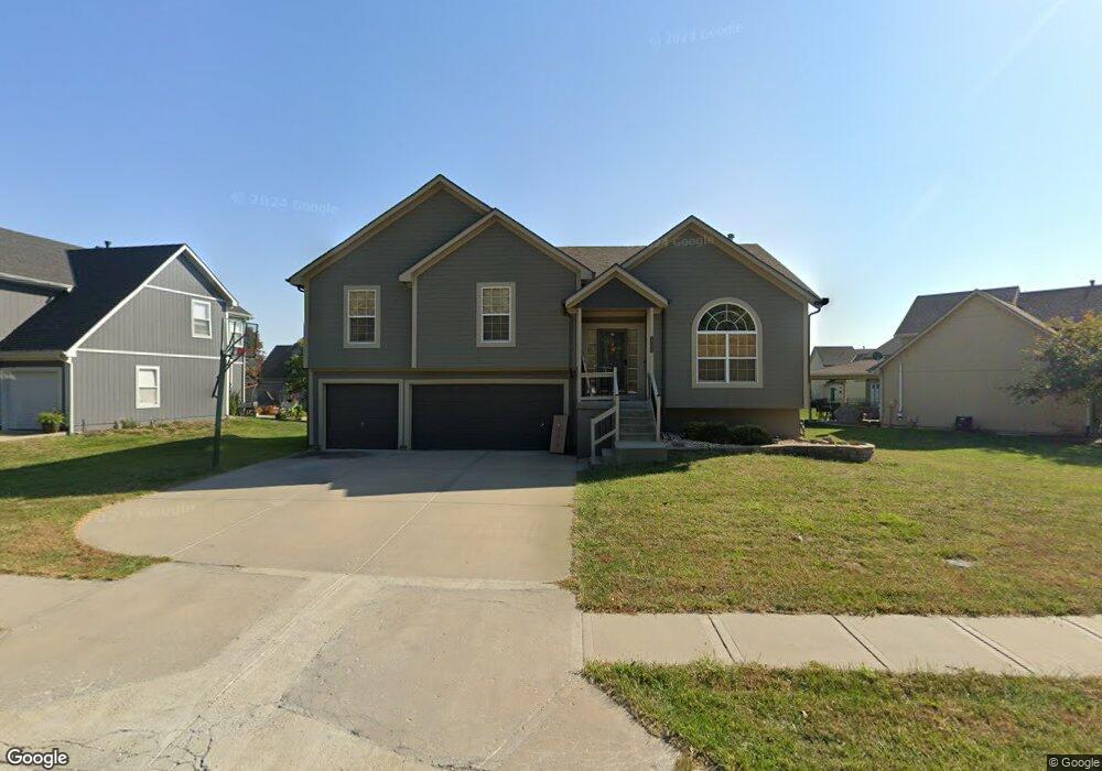 2004 Sequoia Dr, Raymore, MO 64083 - photo 1