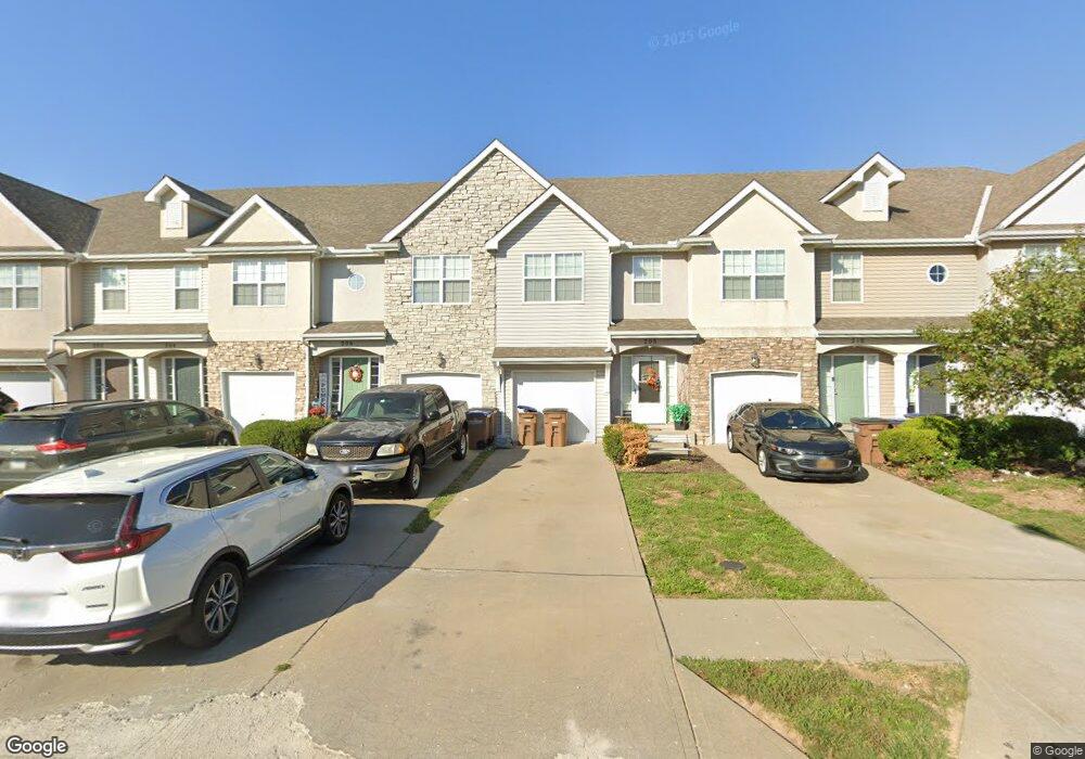 208 Mott Dr, Raymore, MO 64083 - photo 1