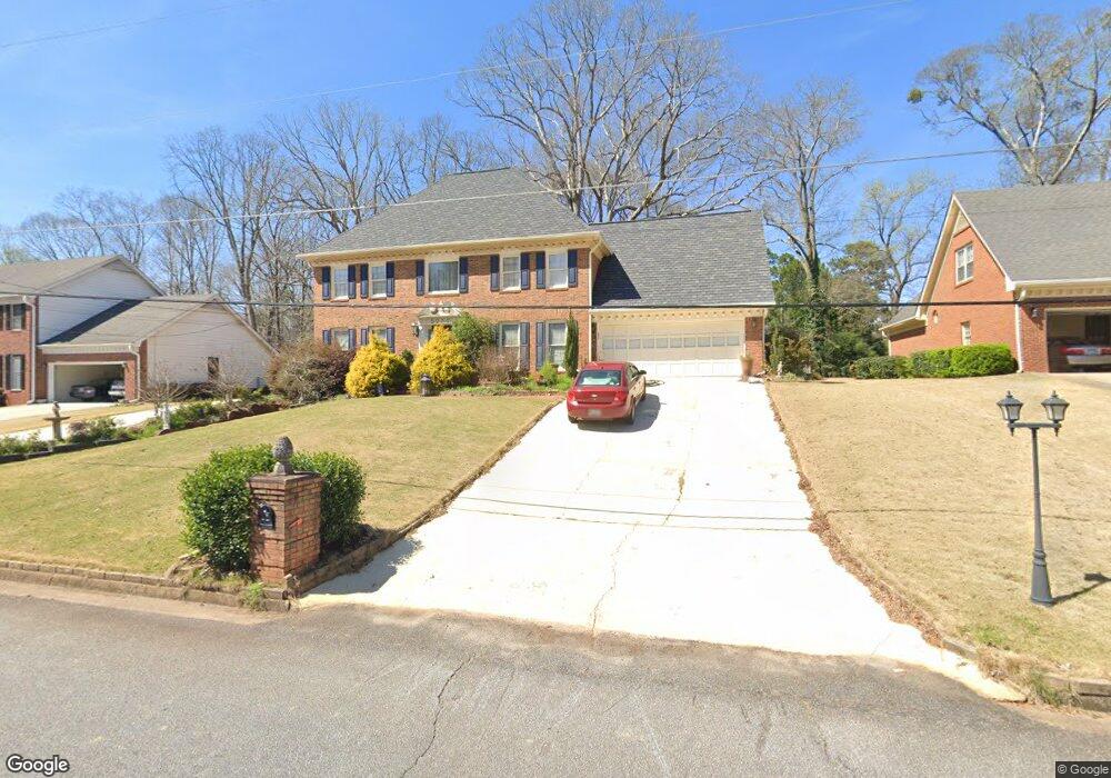 5727 Lost Grove Dr NW, Lilburn, GA 30047 - photo 1