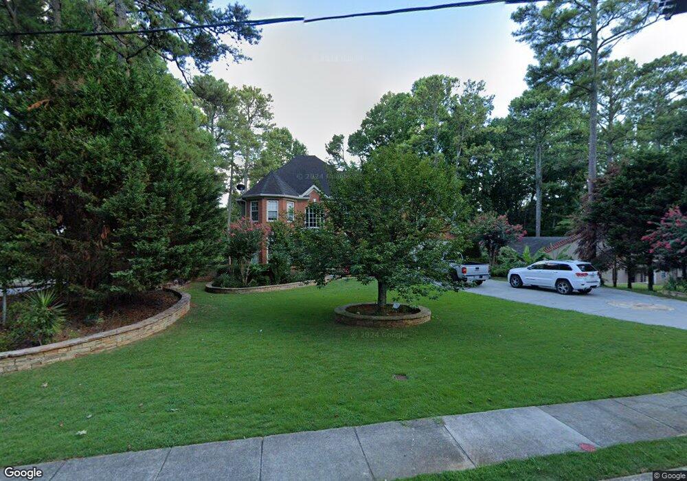 1227 Dickens Rd NW, Lilburn, GA 30047 - photo 1