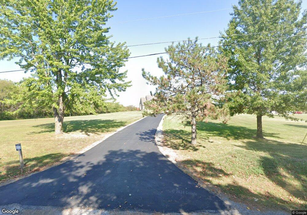 1210 E Lucy Webb Rd, Raymore, MO 64083 - photo 1