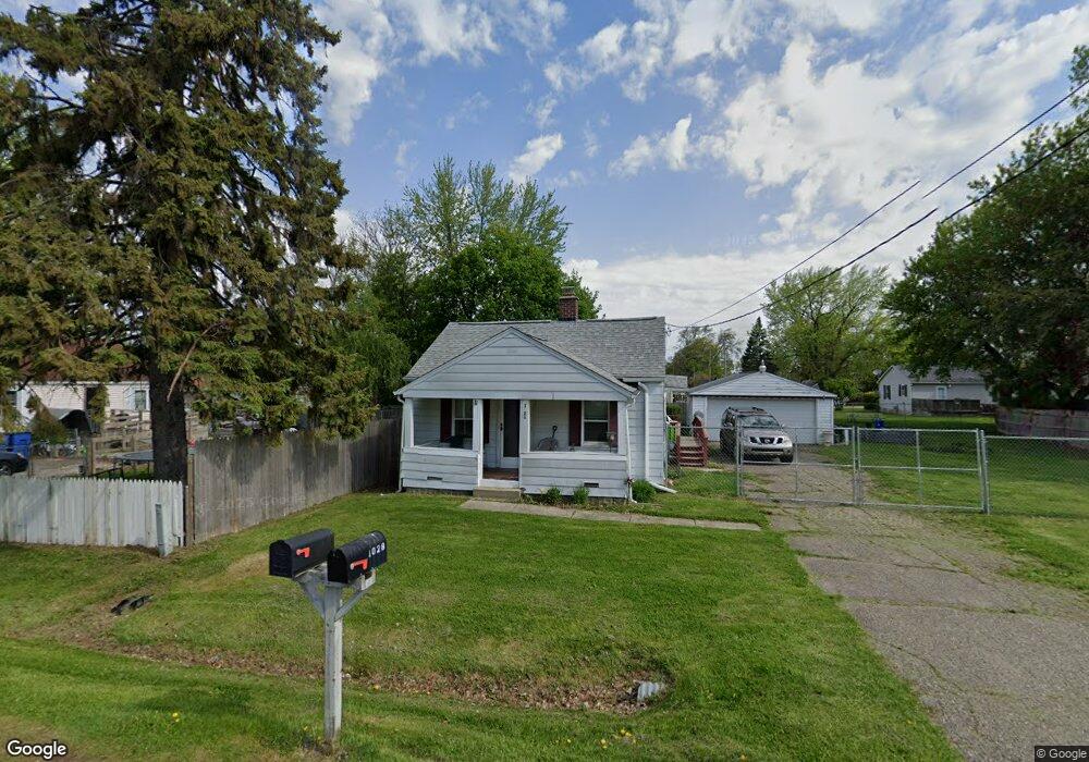 1028 W Schumacher Ave, Flint, MI 48507 - photo 1