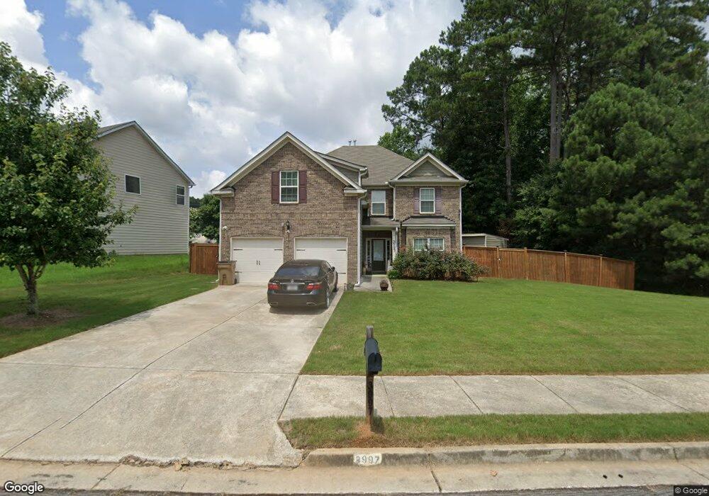 3997 Village Crossing Cir unit 84, Ellenwood, GA 30294 - photo 1