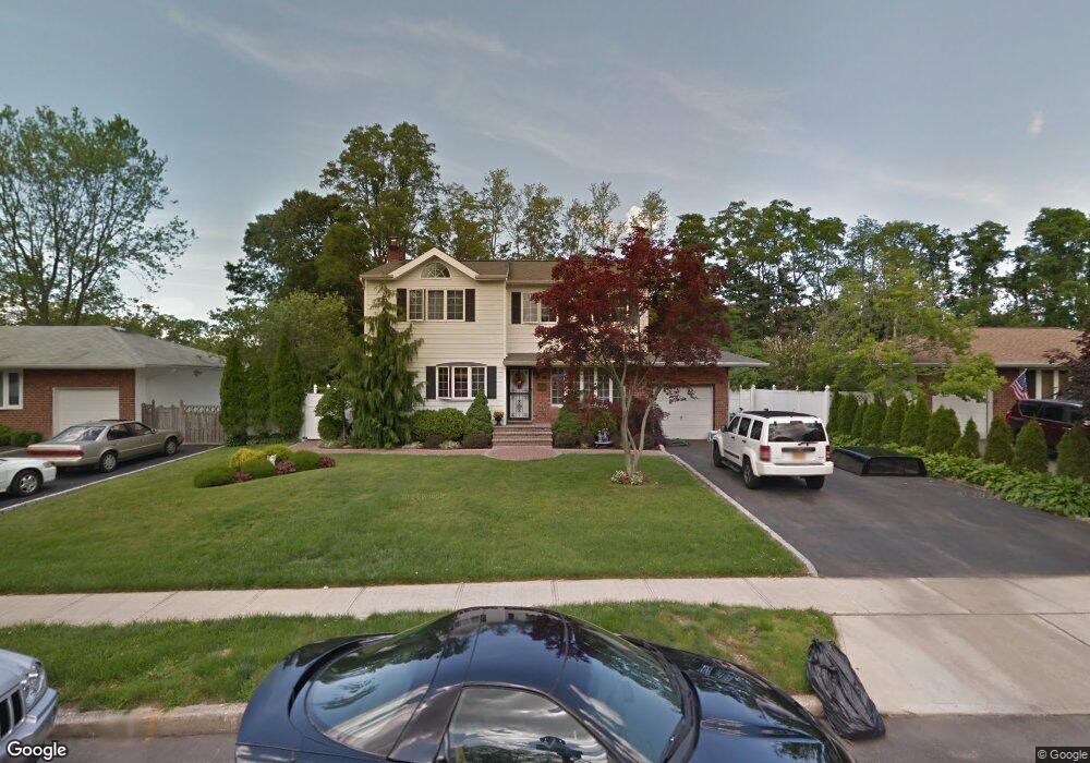 7 Eustace Dr, ComMacK, NY 11725 - photo 1