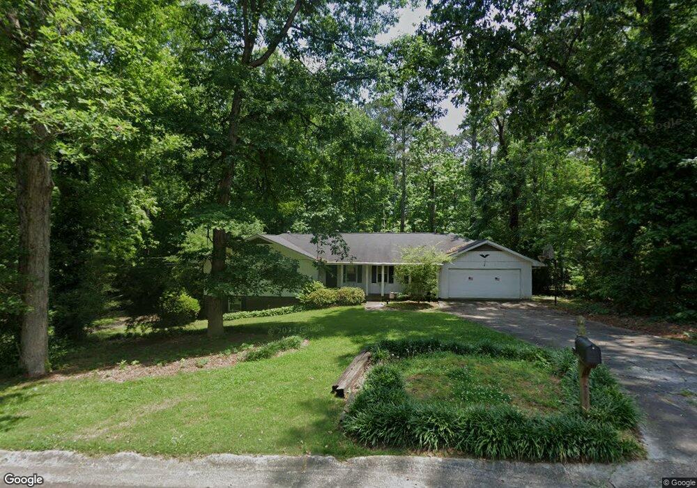 4132 Whispering Forest Ct SW, Lilburn, GA 30047 - photo 1