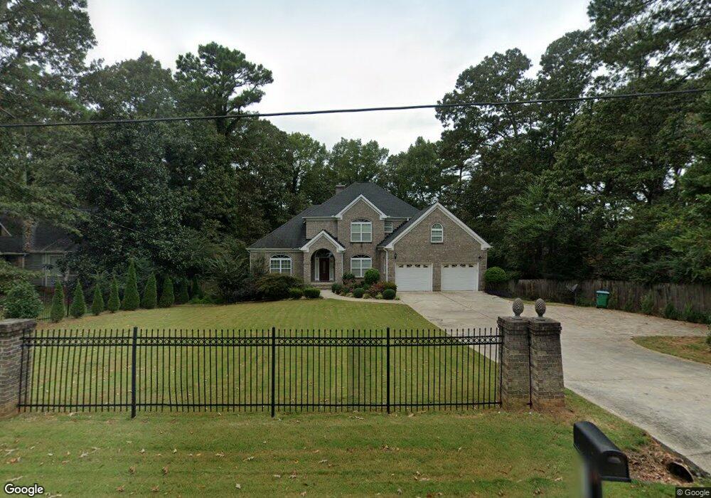 5731 Lilburn Stone Mountain Rd, Stone Mountain, GA 30087 - photo 1