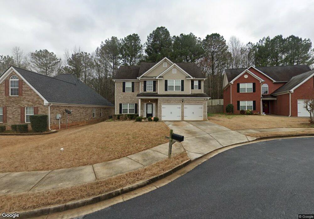 4056 Village Crossing Cir unit 121, Ellenwood, GA 30294 - photo 1
