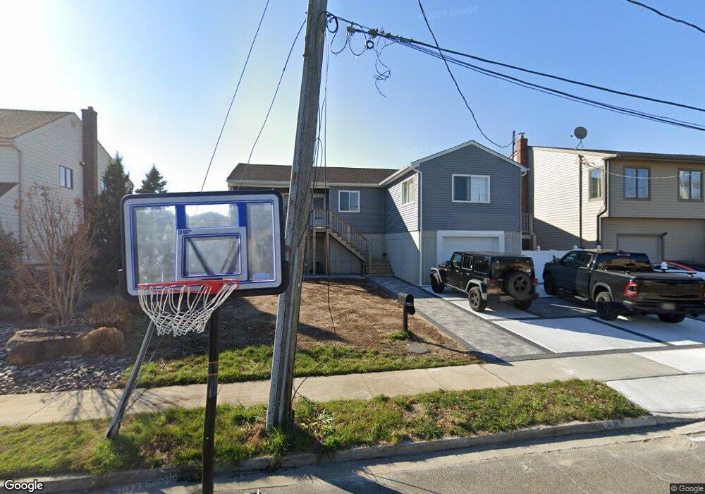 242 Pennsylvania Ave, Island Park, NY 11558 - photo 1