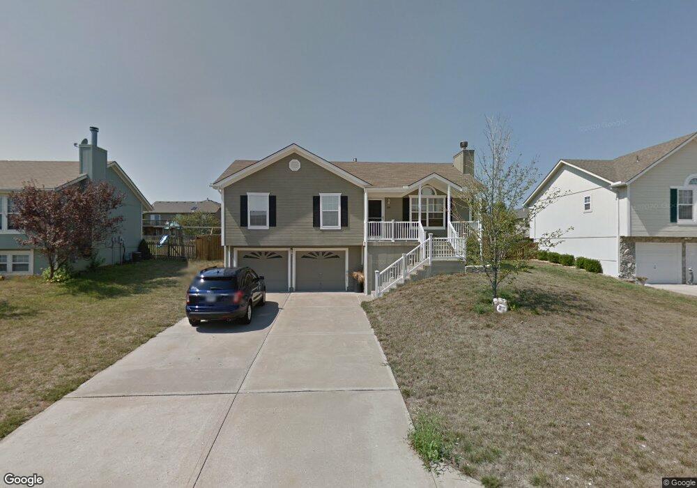 404 Cheyene Dr, Raymore, MO 64083 - photo 1