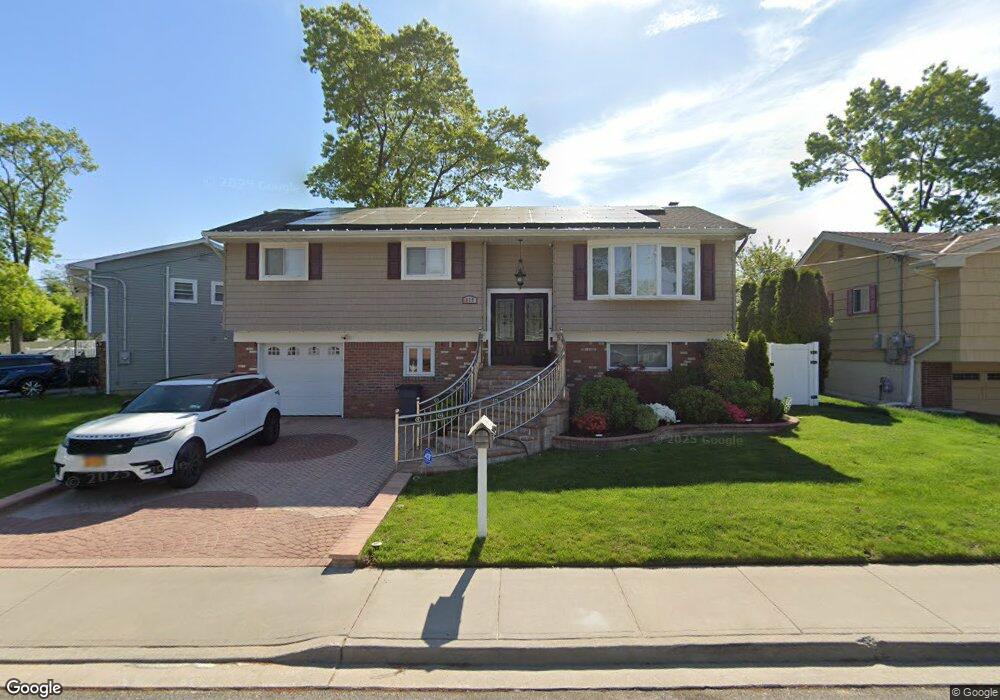 879 Derrick Adkins Ln, West Hempstead, NY 11552 - photo 1