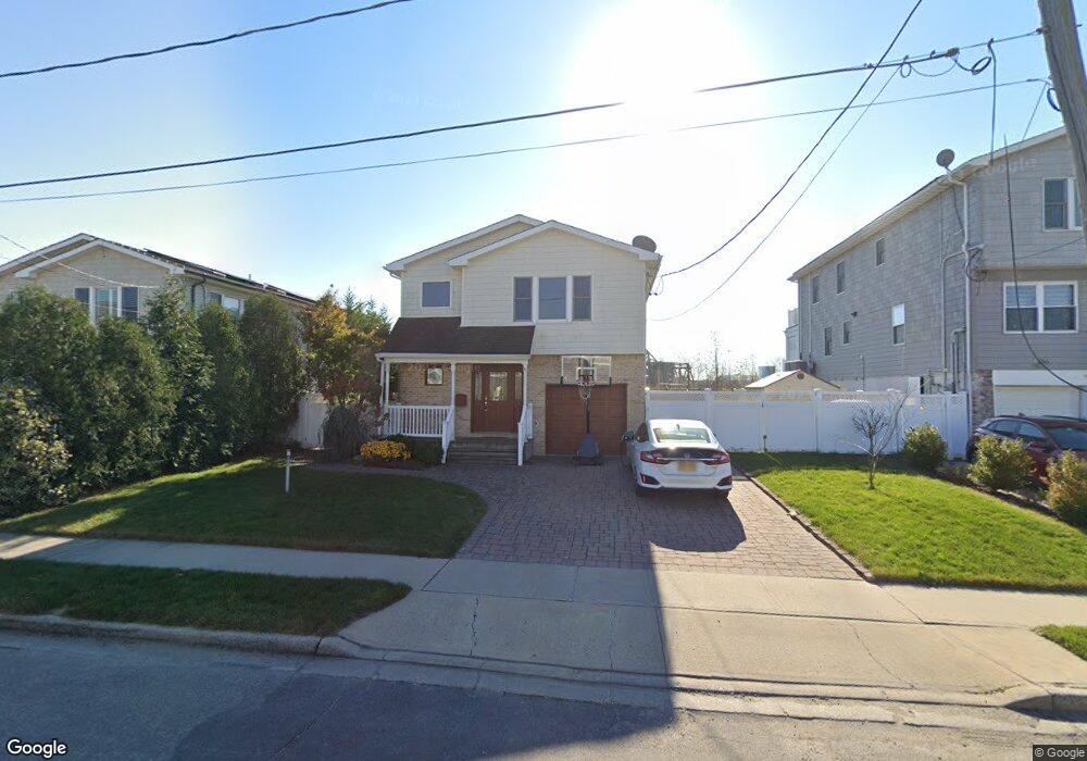 9 Quebec Rd, Island Park, NY 11558 - photo 1