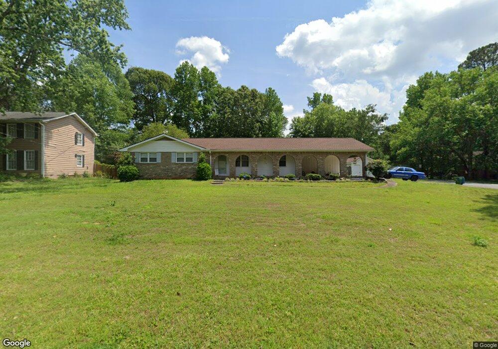 4032 Whispering Forest Ct SW, Lilburn, GA 30047 - photo 1